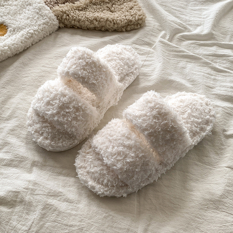 Plush house slippers shown in several solid colors including white brown pink and blue