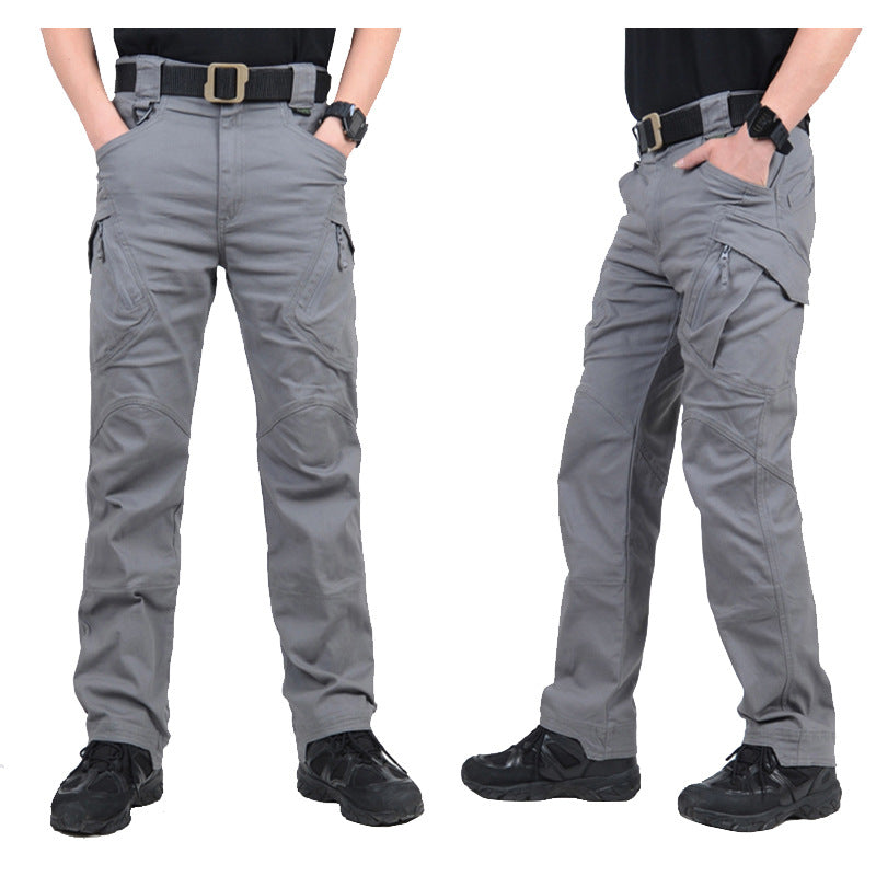 Grey tactical cargo pants worn front and side view showing zip flap thigh pockets
