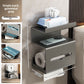 Gun grey and white finishes of the wall mounted bathroom tissue holder side by side