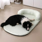 Breathable pea textured pet cooling bed with a rounded shape and light padding