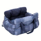 Padded car seat pet bed with raised bolster walls, carry handles and an inner clip product shot on a plain background
