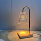 Candle warmer lamp melting a jar candle without a flame