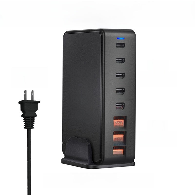 GaN charging tower standing beside its detachable phone stand on a plain background