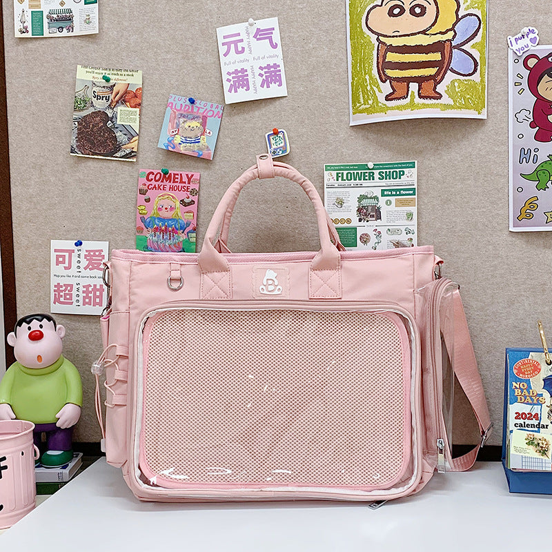 Solid color shoulder bag with handles, long strap and transparent front display pocket