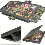 Dark gray felt jigsaw puzzle board with six open sorting drawers around a puzzle in progress, with folded views below