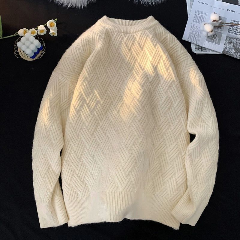 Apricot heavyweight round neck knit pullover with a raised basketweave jacquard texture
