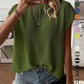 Relaxed fine knit top with a round neck and cap sleeves styled with denim shorts