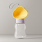 Yellow cloud lid pet water bottle with purple twist ring, open trough and grey hanging carry cord
