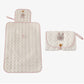 Close detail of the bias-bound seam and soft quilting on the changing pad