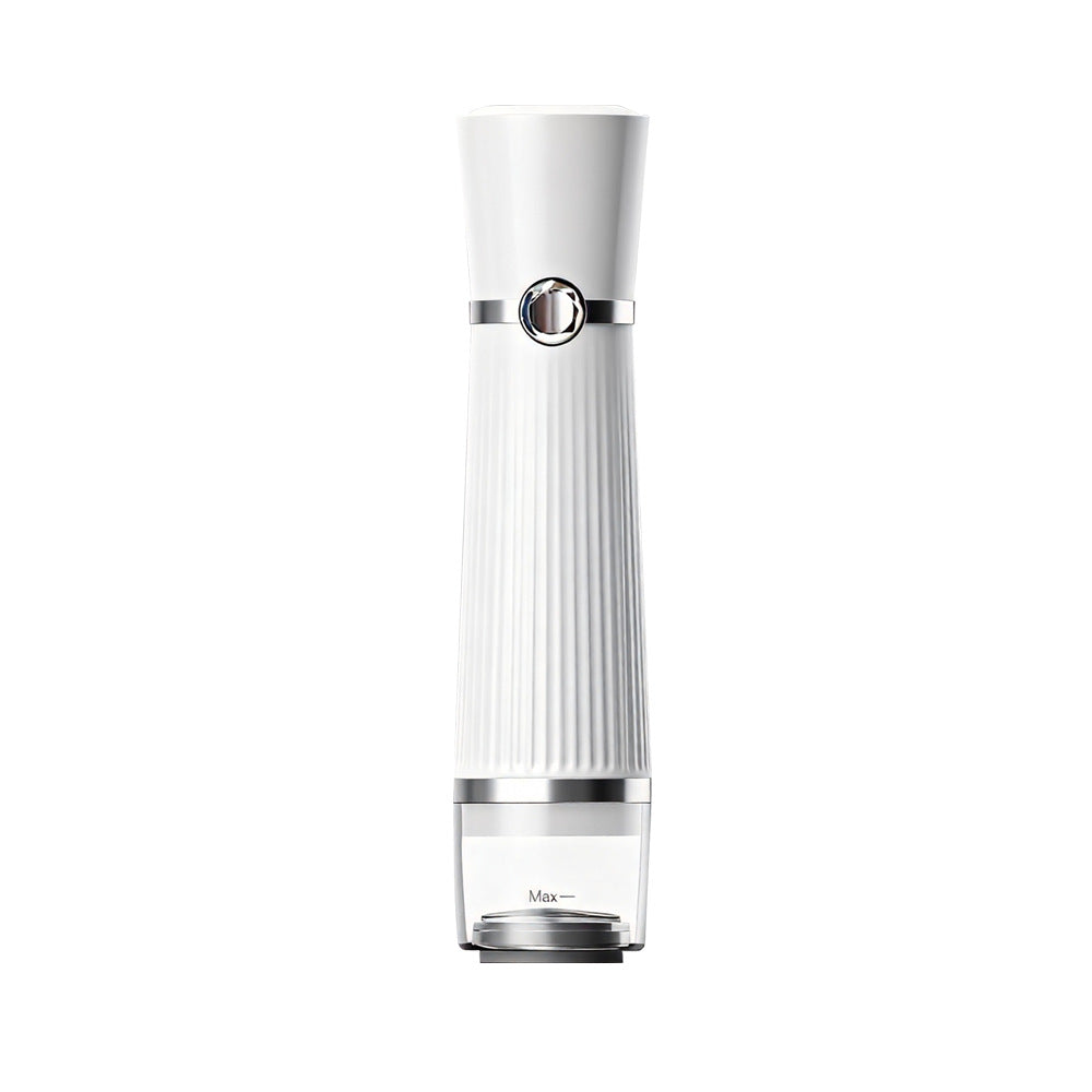 White cordless handheld vacuum sealer with a chrome base and a single touch button on a plain background