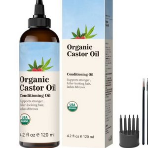 Amber castor hair oil bottle with twist tip beside its box and a black pronged scalp comb, light blue label