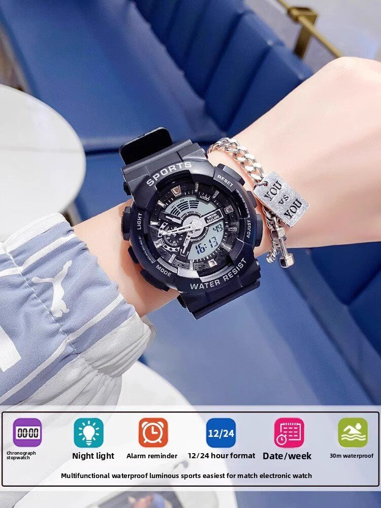 Watch on a bedside table next to a small night lamp