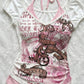 Slim white short sleeve tee with attached pink faux halter panel, flat lay view