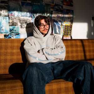 Oversize velvet hoodie shown loose on model from the front