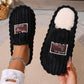 Black option, size 36-37: ribbed plush slippers with a cream plush lining and an Original label patch