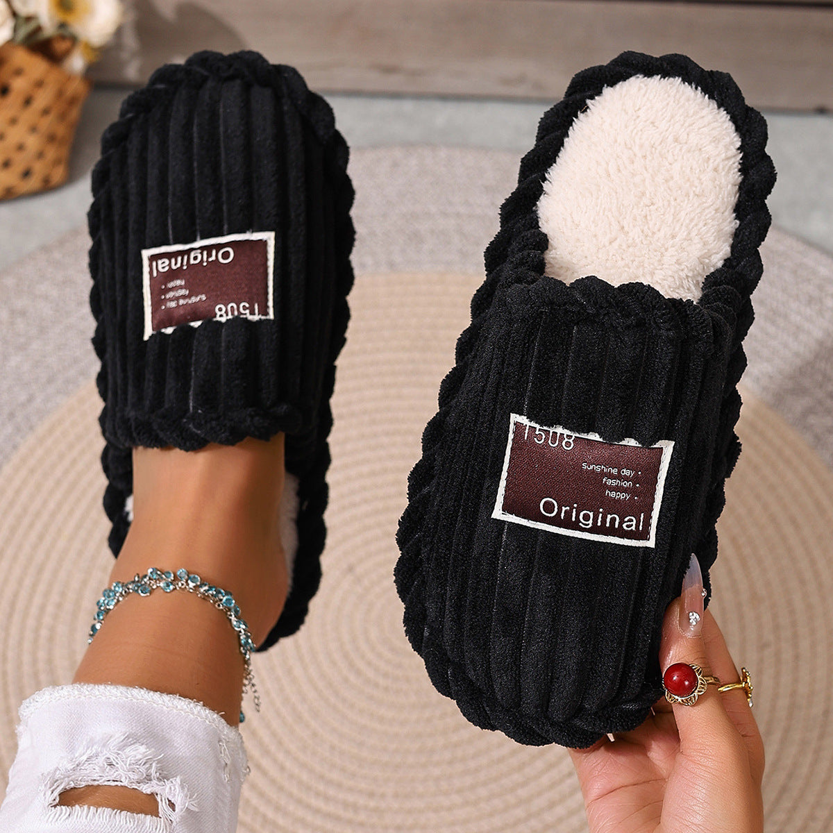 Black option, size 36-37: ribbed plush slippers with a cream plush lining and an Original label patch