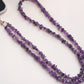 Front view of the purple chip-bead phone strap with its metal clip and tab