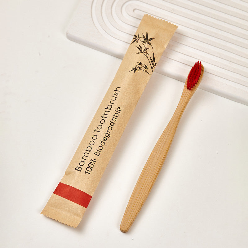 Bamboo manual toothbrush with soft nylon bristles in a studio product shot