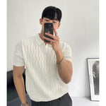 White mens knit short sleeve polo with an open lapel collar worn by a model