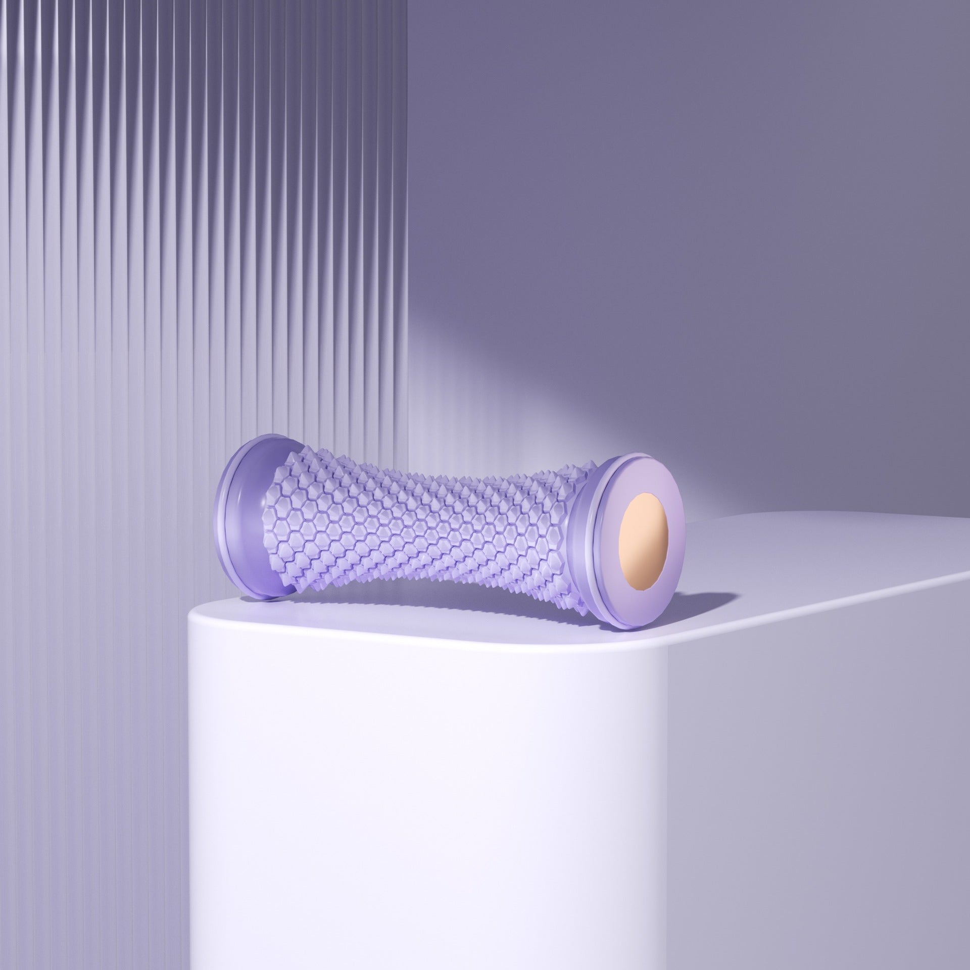 Detail of the studded surface and round end cap of the foot massage roller