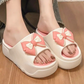 Womens platform slides, white bow platform slide from the side