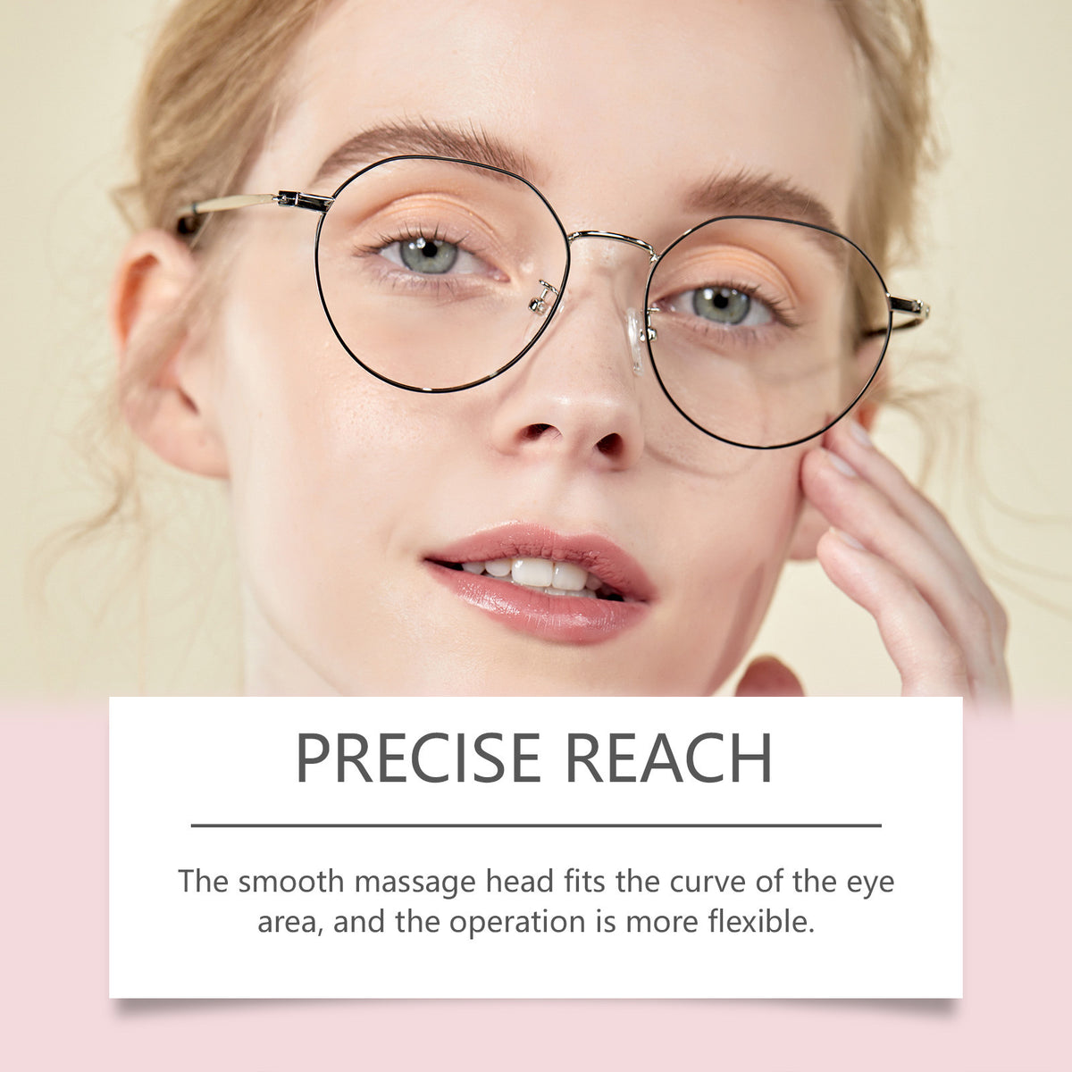 Close view of the smooth massage head reaching the curve of the eye area on a model