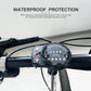 Black e-bike display panel mounted on a bicycle handlebar under an IP65 waterproof protection headline