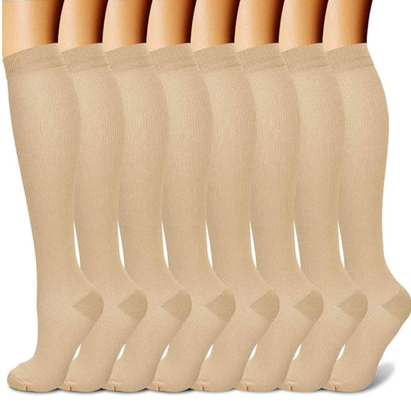 Close view of the ribbed cuff and knit texture on a knee-high compression sock