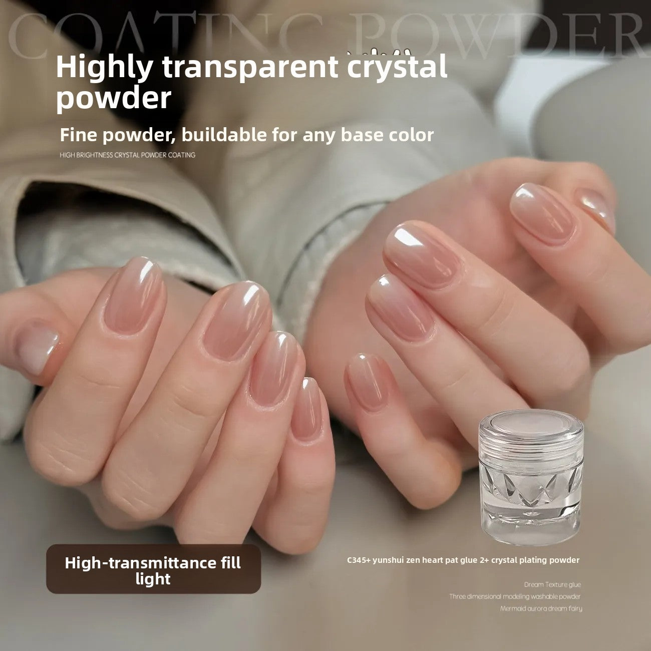 Glossy nude manicured nails beside a small clear jar of transparent crystal nail powder