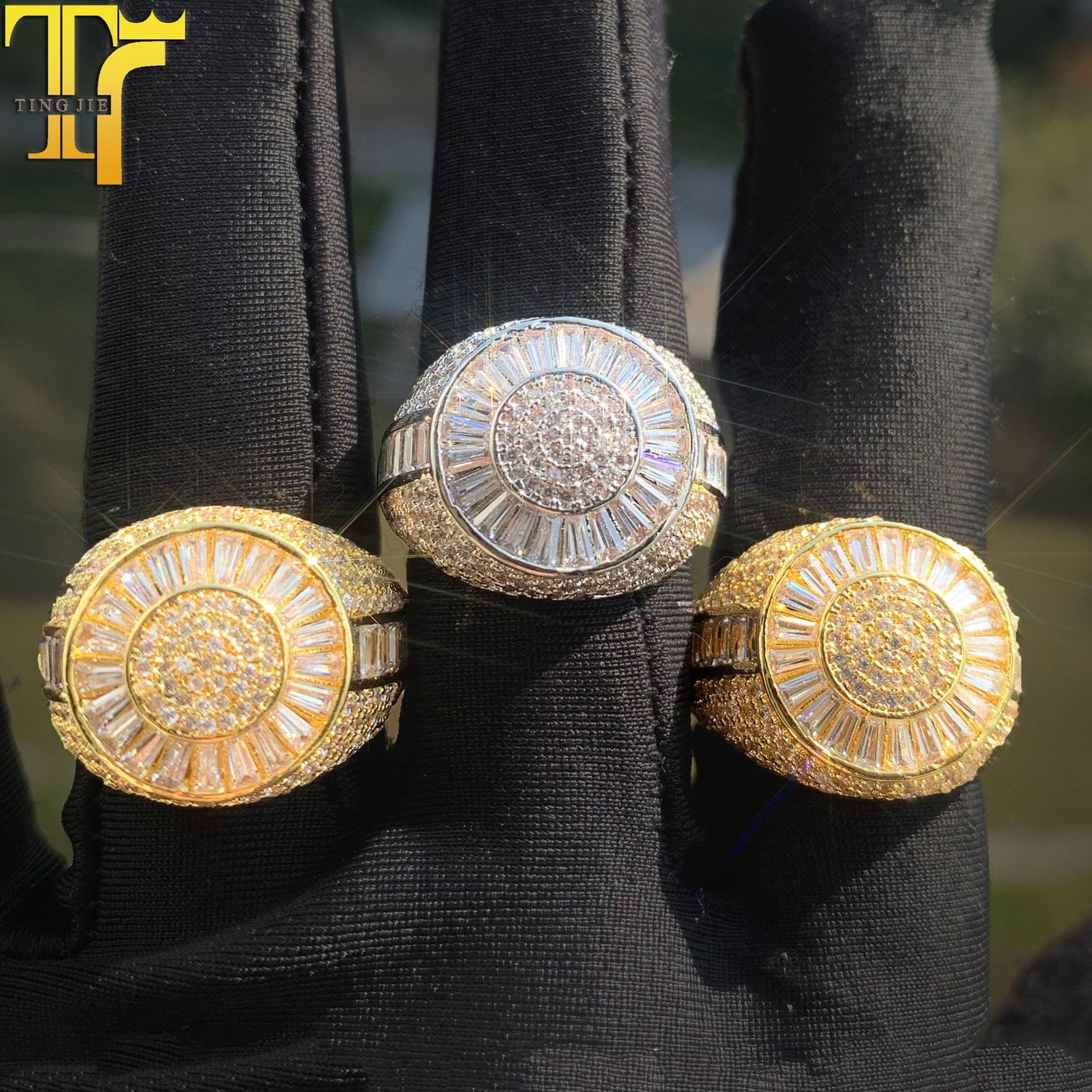 Zircon hip hop ring worn on a hand, wide band with faceted stones