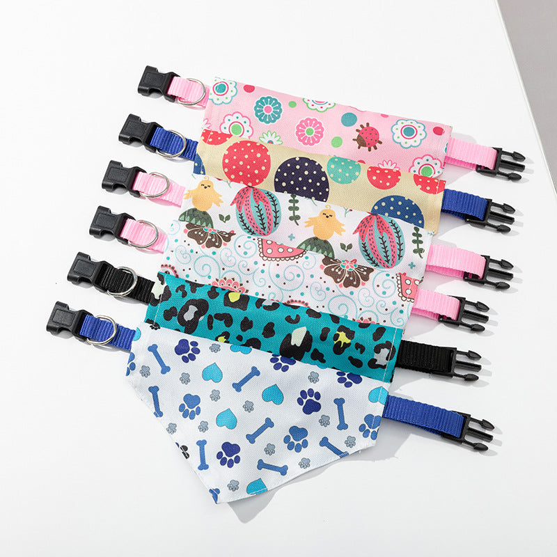 Printed triangle dog bandana on an adjustable nylon collar