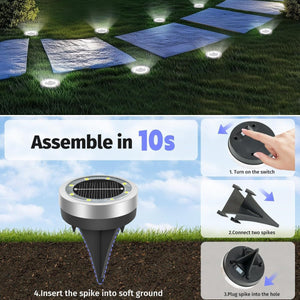 Round solar in ground garden light with a stainless steel rim and top solar panel