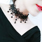 Gothic style vintage lace choker necklace shown close at the neck