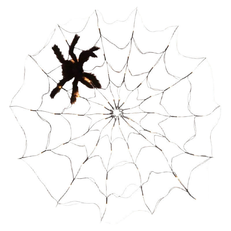 Unlit black spider web net light with a furry black spider prop on a white background