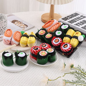 Flat lay of food pattern cotton crew socks in bright colours, sushi and roll designs knit into the cotton
