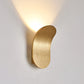 Brushed gold curved wall lamp with upward glow, option photo for three color dimming