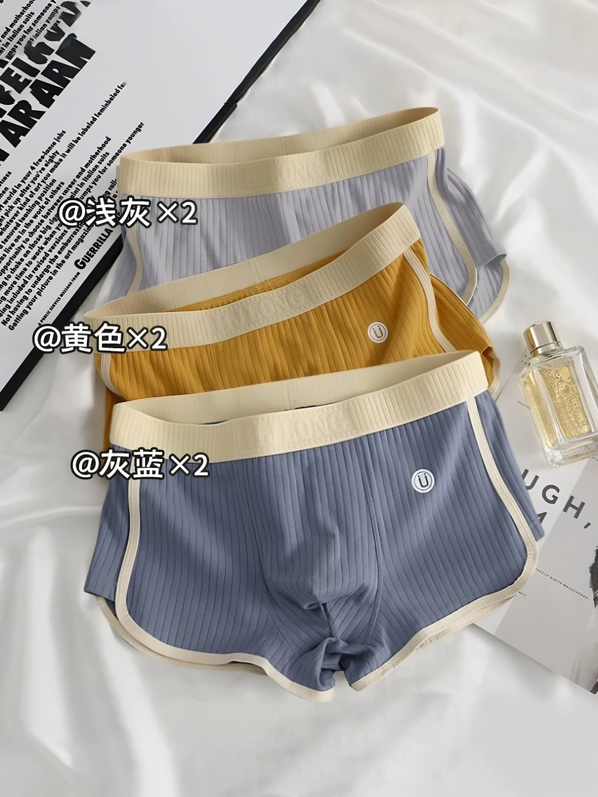 Men's ribbed cotton boxer briefs flat lay in a contrasting colour on soft fabric