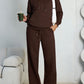 Brown fleece hooded sweatshirt and wide-leg sweatpants set worn by a model