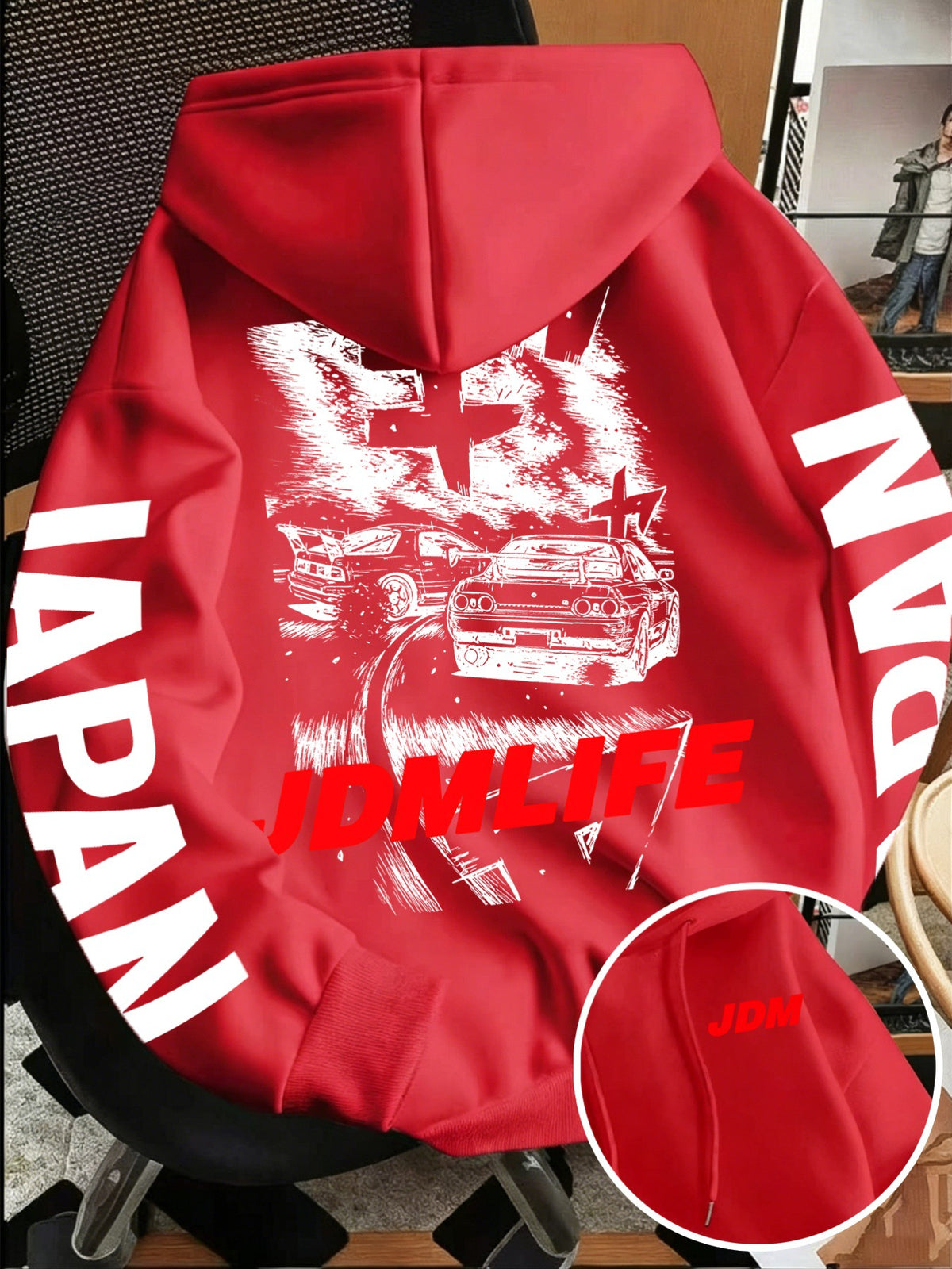 Drawstring hood and kangaroo pocket on the oversized JDM drift graphic fleece hoodie