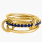 Linked stacked band ring shown polished against a neutral backdrop
