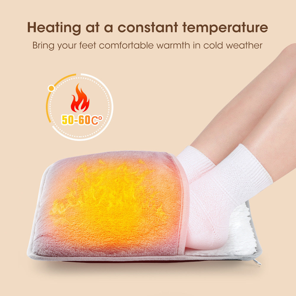 Gray plush electric foot warmer with both feet slipped inside, shown warming in cold weather