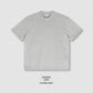 Model wearing the oversized heavyweight cotton crew neck tee with a relaxed drop shoulder cut