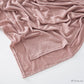 Dusty rose modal cotton headscarf wrap in soft folds showing the fine jersey knit and rolled hem edge