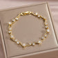 Zircon Gold Plated Leaf Design