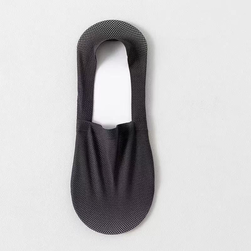 Black footie sock flat lay showing breathable mesh and low-cut invisible shape