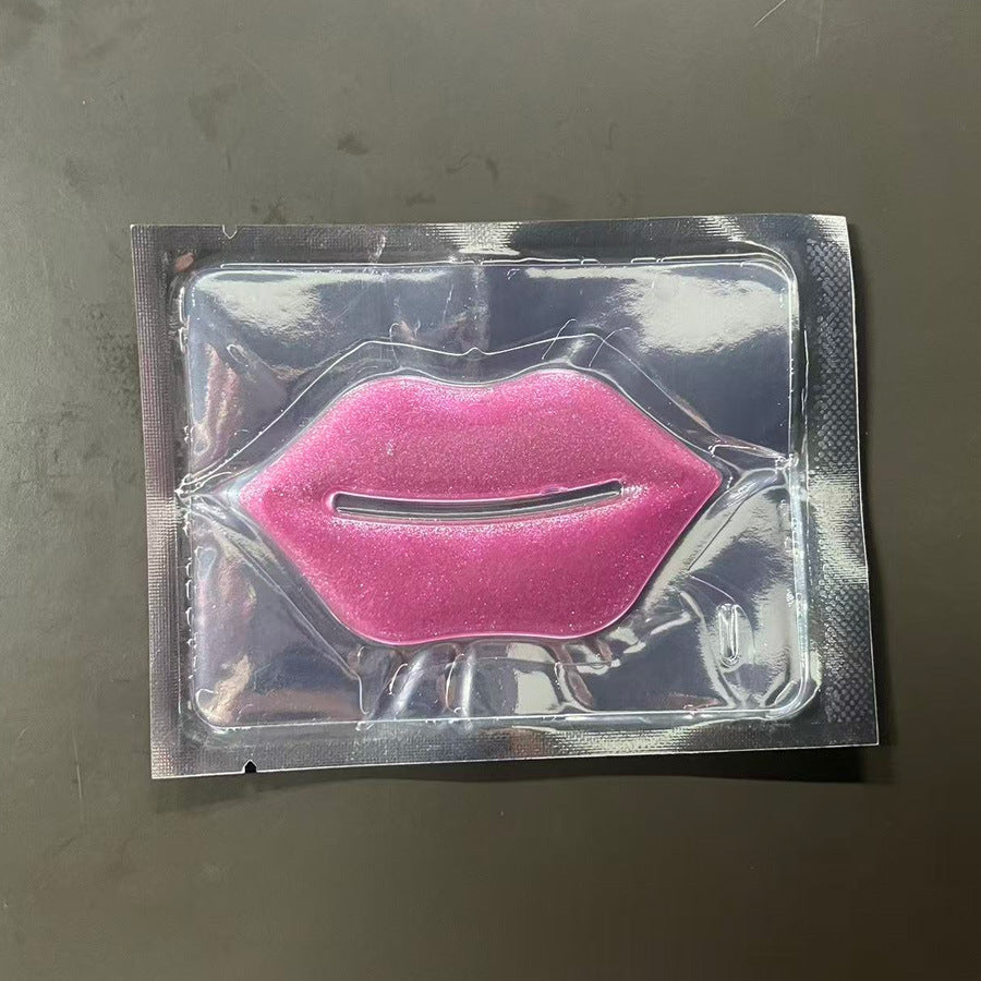 Magenta pink glittery hydrogel lip mask patch in a foil sachet