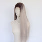 Side view of a long straight gray ombre lace front wig with dark brown roots on a mannequin