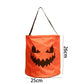 Unlit orange pumpkin party bag with a jagged carved face and a black webbing handle