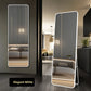Rounded corner rectangular mirror shown wall mounted in a bright bedroom setting