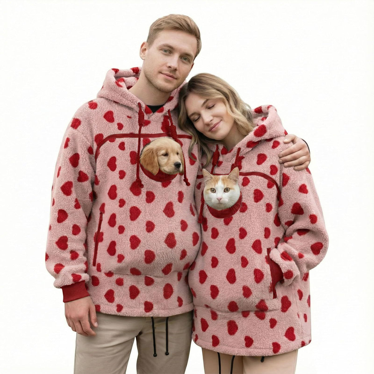 Couple in blush pink fleece hoodies with red hearts, a puppy and a cat in the chest pouches, size L option